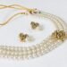 Introducing the Royal Splendor Necklace Set: A Blend of Moti Pearls and Sparkling Kundan Stones